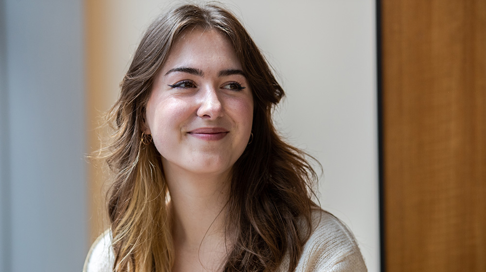 side profile of student smiling
